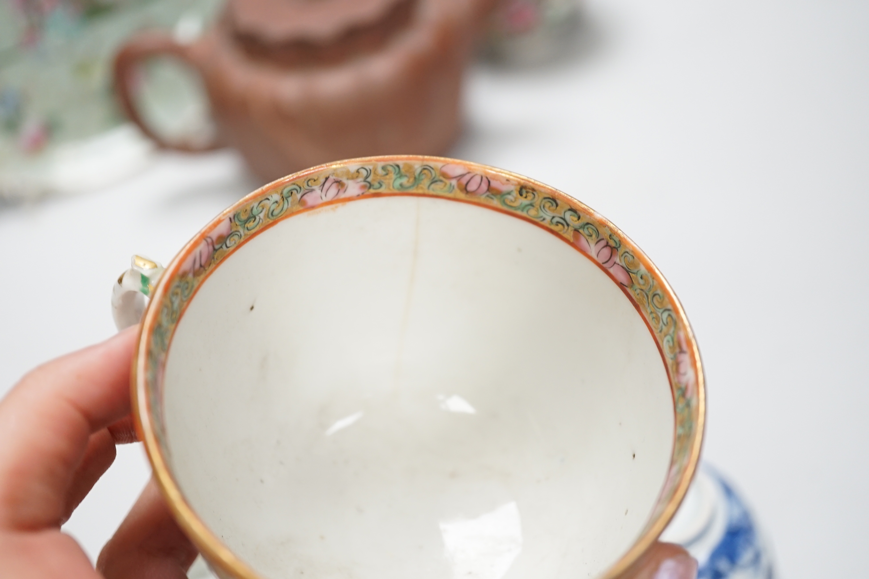 Chinese and Japanese ceramics, including Canton cups and blue and white teabowl, seven various Chinese famille rose dishes, 19th century, a Chinese Yixing teapot and a bronze censer